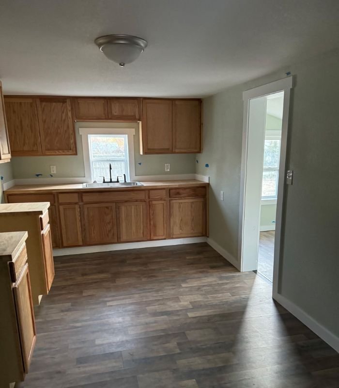 Modern kitchen with updated cabinets, countertops, and bright finishes